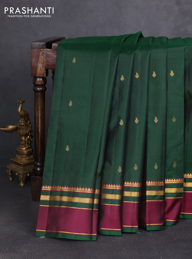 Pure kanchipuram silk saree bottle green and dark pink with zari woven buttas and rettapet zari woven border