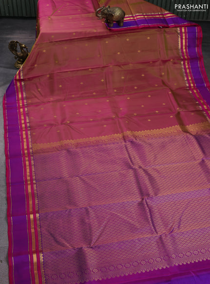 Pure kanchipuram silk saree dual shade of pinkish green and purple with zari woven buttas and rettapet zari woven border