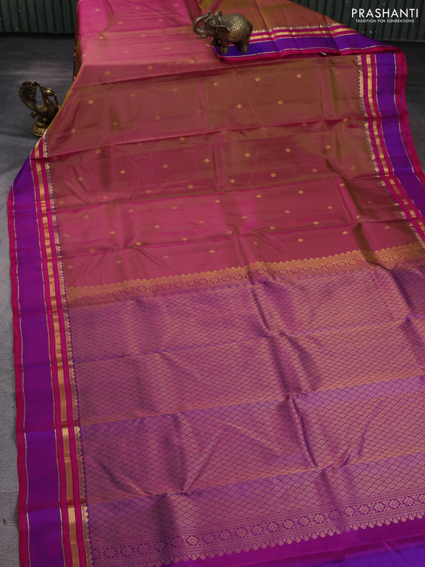 Pure kanchipuram silk saree dual shade of pinkish green and purple with zari woven buttas and rettapet zari woven border