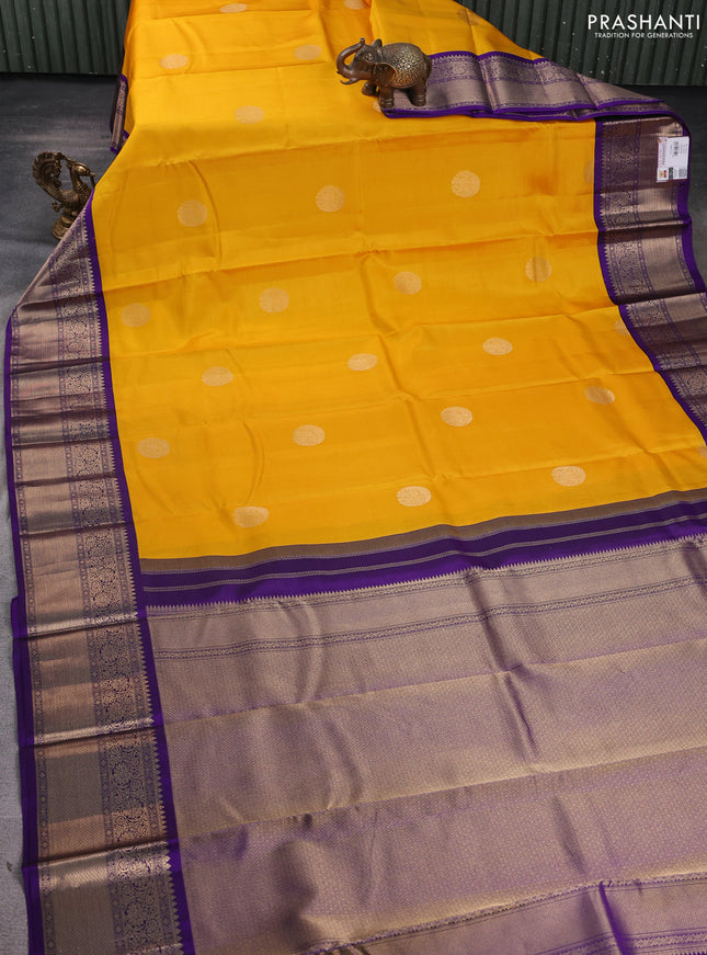Pure kanchipuram silk saree yellow and violet with zari woven buttas and rich zari woven korvai border