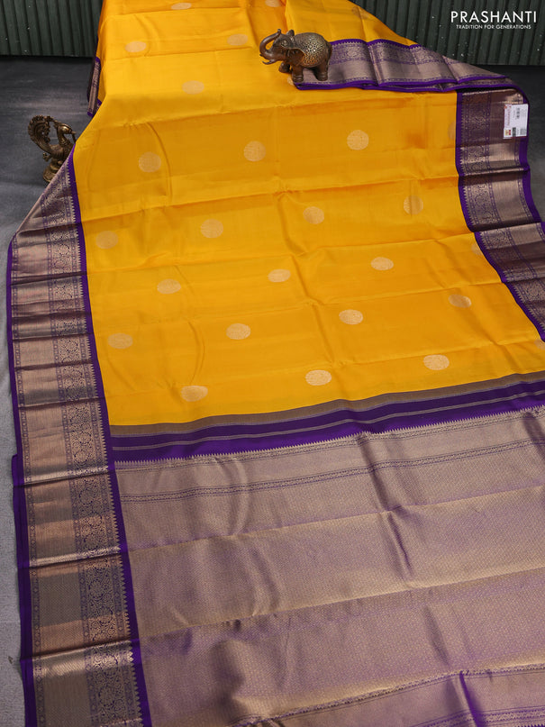 Pure kanchipuram silk saree yellow and violet with zari woven buttas and rich zari woven korvai border