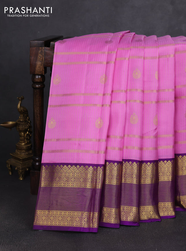 Pure kanchipuram silk saree lotus pink and violet with allover zari stripe & buttas and rich zari woven korvai border