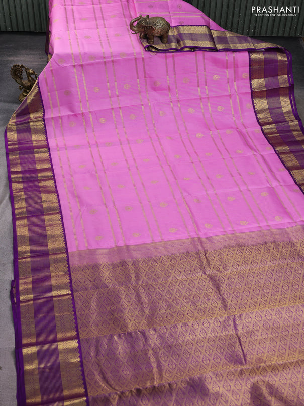 Pure kanchipuram silk saree lotus pink and violet with allover zari stripe & buttas and rich zari woven korvai border