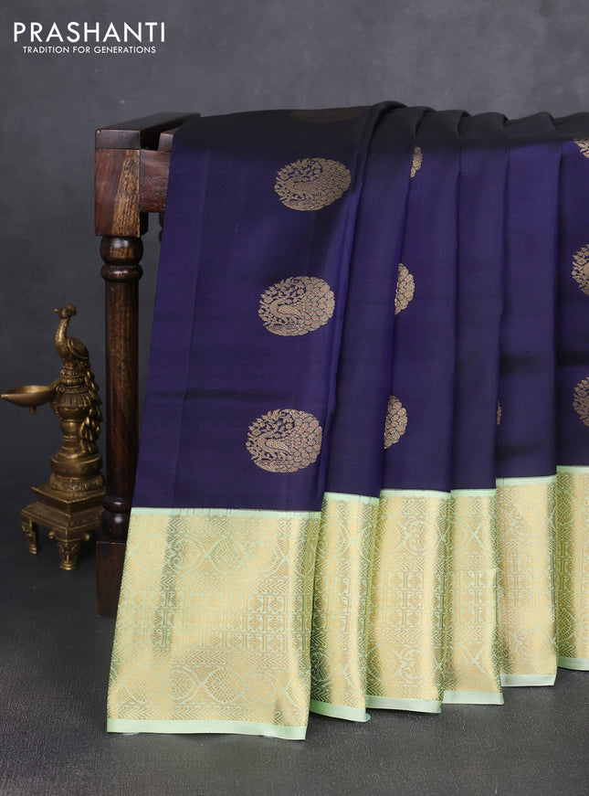 Pure kanchipuram silk saree navy blue and pista green with zari woven buttas and long zari woven korvai border