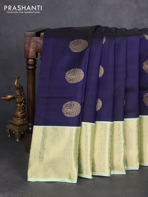 Pure kanchipuram silk saree navy blue and pista green with zari woven buttas and long zari woven korvai border