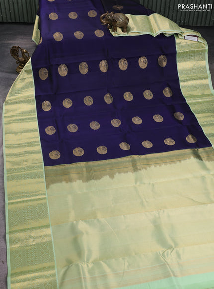 Pure kanchipuram silk saree navy blue and pista green with zari woven buttas and long zari woven korvai border