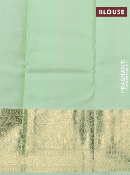 Pure kanchipuram silk saree navy blue and pista green with zari woven buttas and long zari woven korvai border
