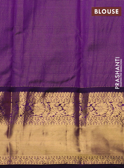 Pure kanchipuram silk saree mild teal green and purple with allover zari stripe & buttas and long zari woven korvai border