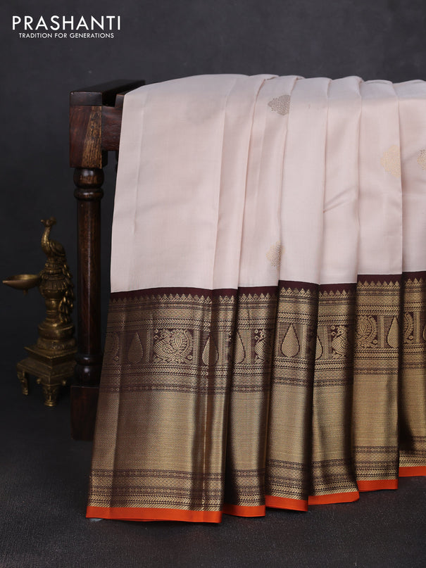 Pure kanchipuram silk saree cream and coffee brown with zari woven buttas and long zari woven korvai border
