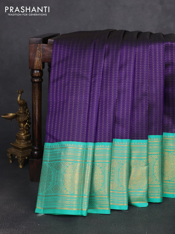 Pure kanchipuram silk saree blue and teal blue with allover zari checks & buttas and long zari woven korvai border