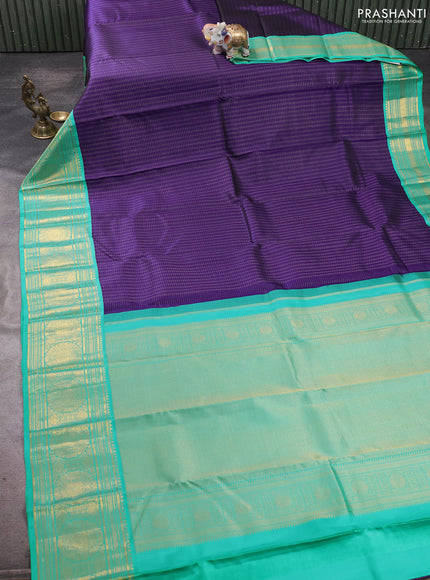 Pure kanchipuram silk saree blue and teal blue with allover zari checks & buttas and long zari woven korvai border