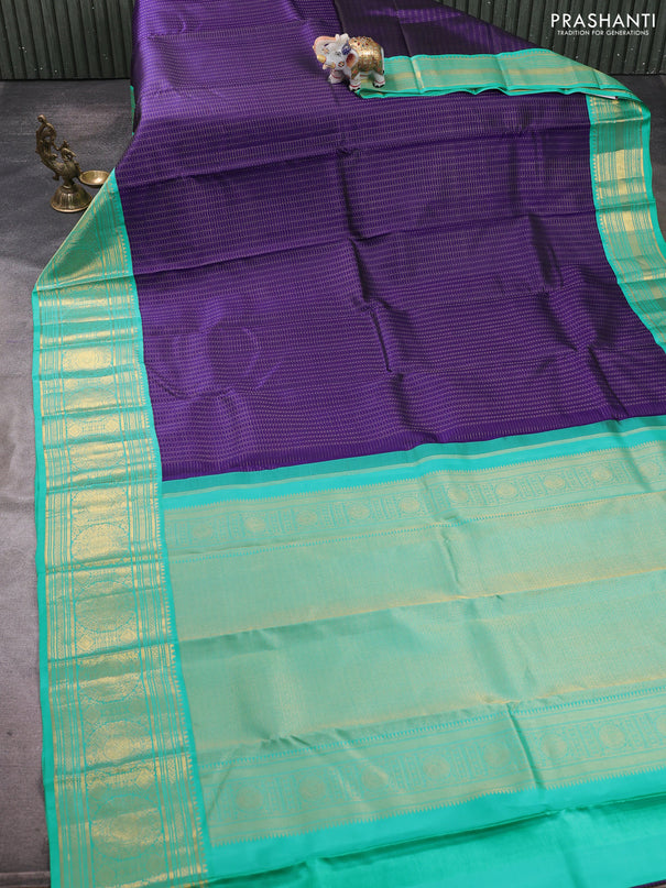 Pure kanchipuram silk saree blue and teal blue with allover zari checks & buttas and long zari woven korvai border
