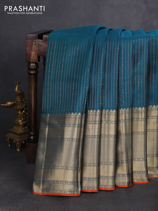 Pure kanchipuram silk saree peacock blue and orange with allover zari weaves and long zari woven border