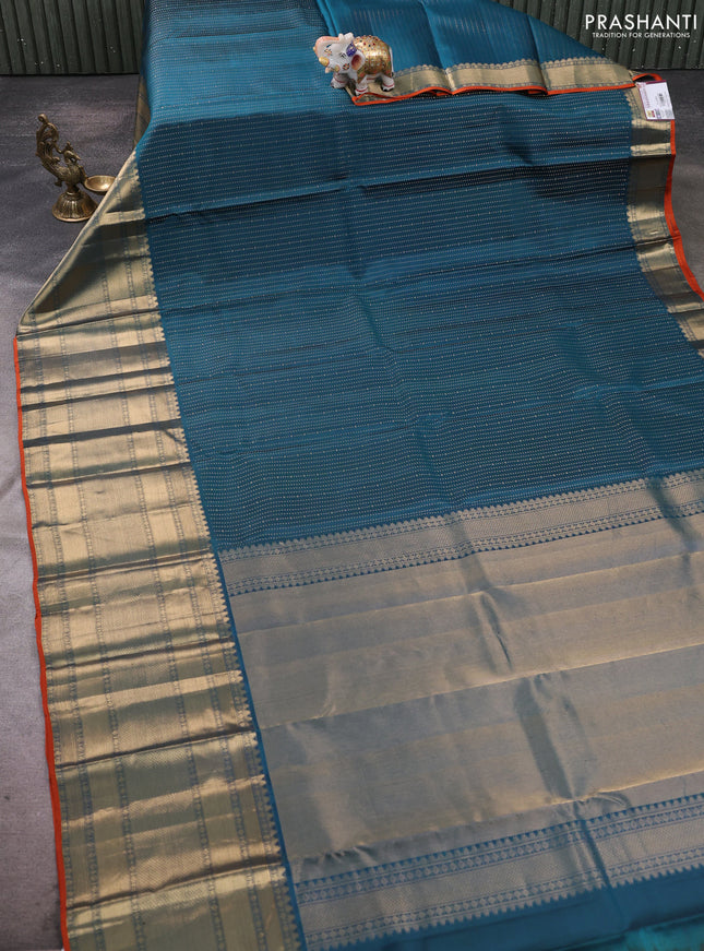 Pure kanchipuram silk saree peacock blue and orange with allover zari weaves and long zari woven border