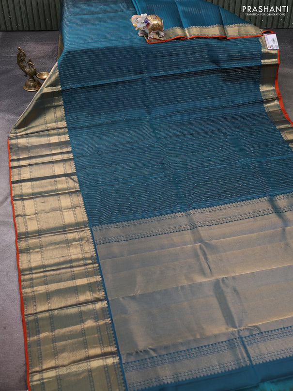 Pure kanchipuram silk saree peacock blue and orange with allover zari weaves and long zari woven border