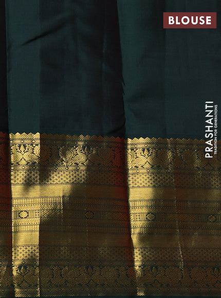 Pure kanchipuram silk saree dual shade of pink and bottle green with zari woven buttas and long zari woven korvai border