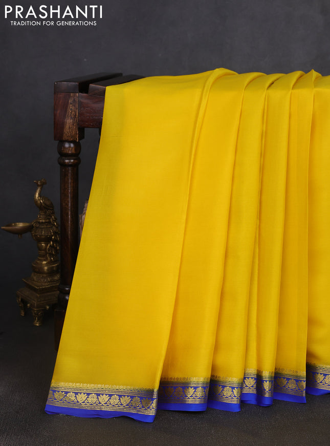 Pure mysore silk saree yellow and royal blue with plain body and zari woven border