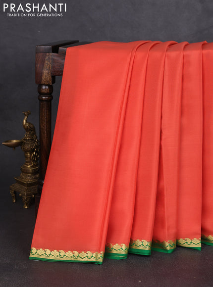 Pure mysore silk saree peach shade and green with plain body and zari woven border