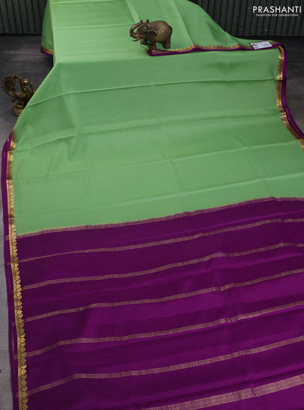 Pure mysore silk saree pastel green and purple with plain body and zari woven border