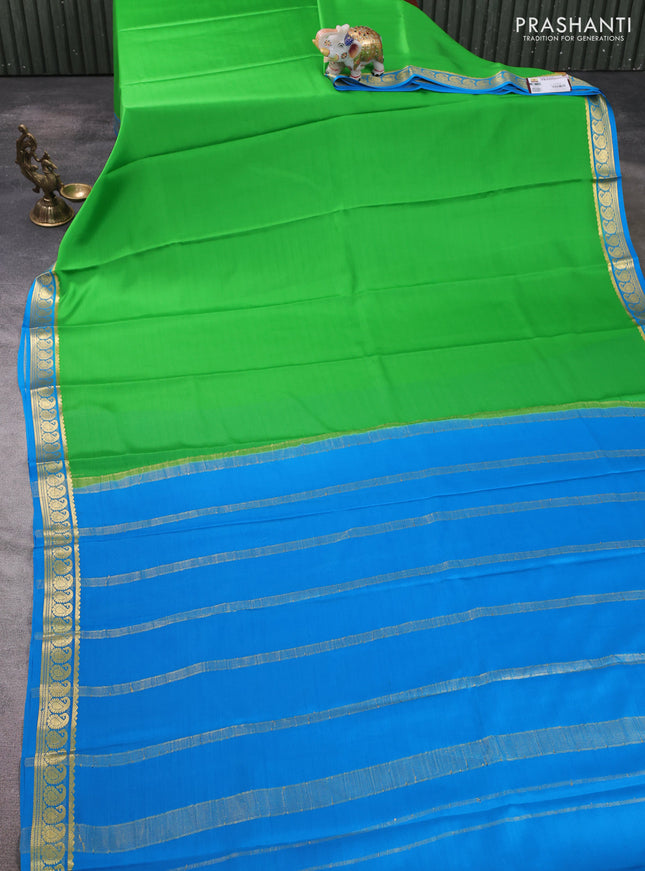 Pure mysore silk saree parrot green and cs blue with plain body and zari woven border