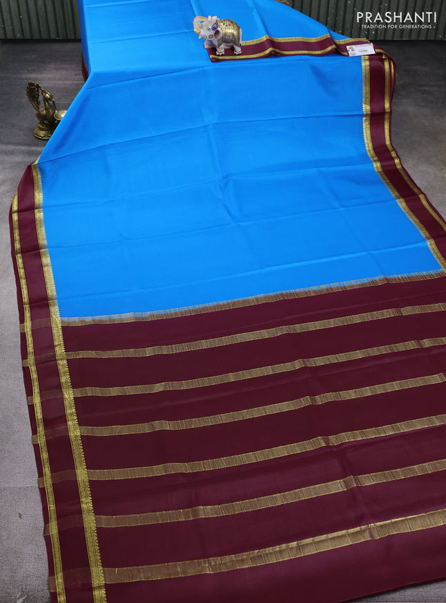 Pure mysore silk saree blue and maroon with plain body and rettapet zari woven border