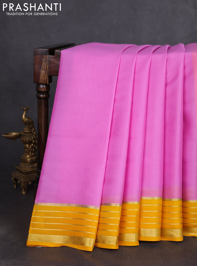 Pure mysore silk saree light pink and mango yellow with plain body and zari woven border