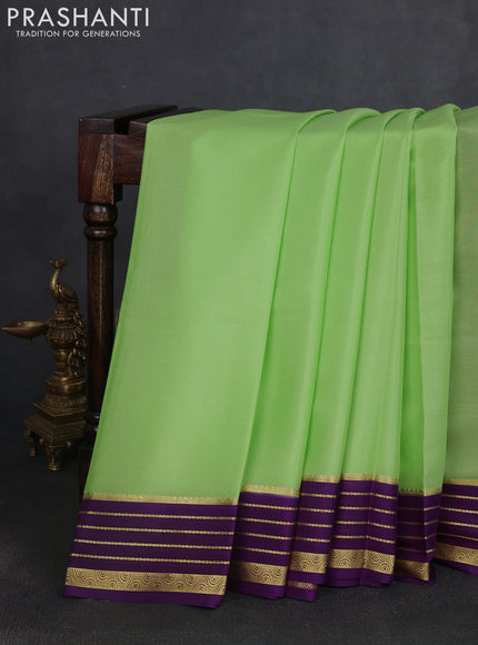 Pure mysore silk saree pista green and purple with plain body and zari woven border