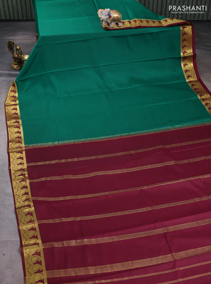 Pure mysore silk saree dark green and deep maroon with plain body and paisley zari woven border