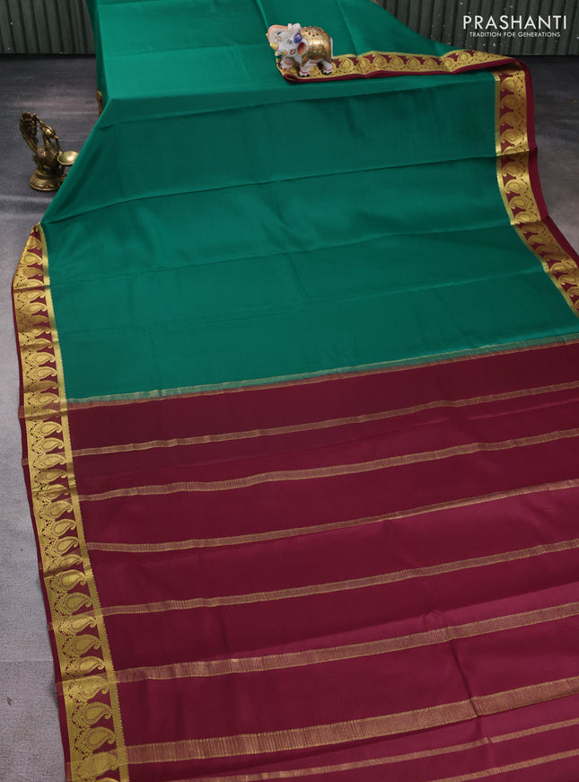 Pure mysore silk saree dark green and deep maroon with plain body and paisley zari woven border
