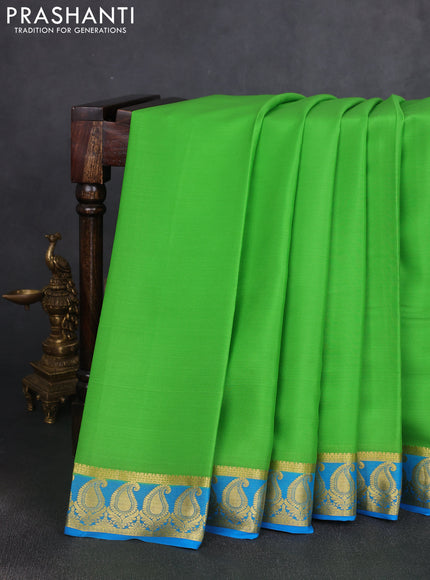 Pure mysore silk saree parrot green and cs blue with plain body and paisley zari woven border