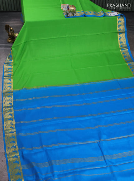 Pure mysore silk saree parrot green and cs blue with plain body and paisley zari woven border