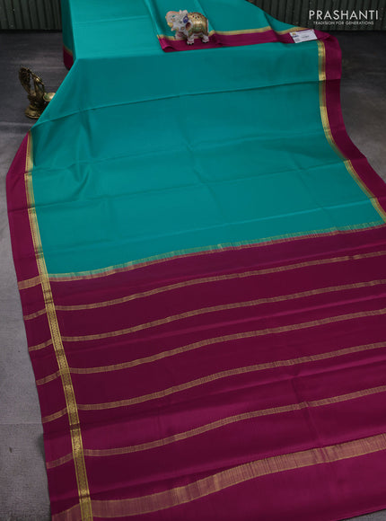 Pure mysore silk saree teal green shade and pink with plain body and zari woven simple border