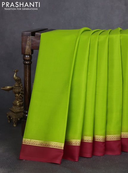 Pure mysore silk saree light green and maroon with plain body and zari woven simple border