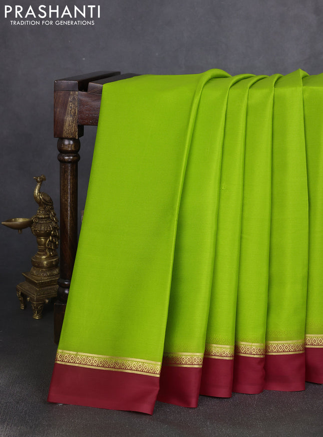 Pure mysore silk saree light green and maroon with plain body and zari woven simple border