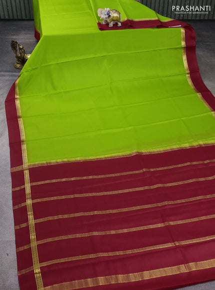 Pure mysore silk saree light green and maroon with plain body and zari woven simple border