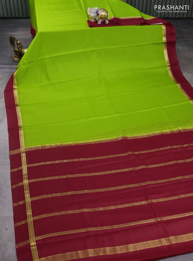 Pure mysore silk saree light green and maroon with plain body and zari woven simple border
