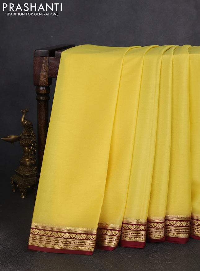 Pure mysore silk saree yellow and deep maroon with plain body and zari woven border