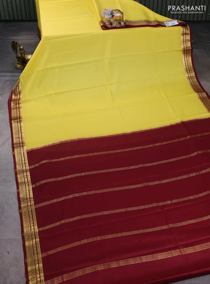 Pure mysore silk saree yellow and deep maroon with plain body and zari woven border