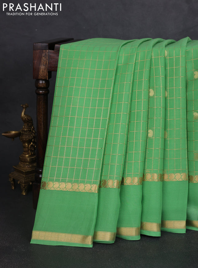 Pure mysore silk saree pastel green shade with allover zari checks & buttas and rettapet zari woven border