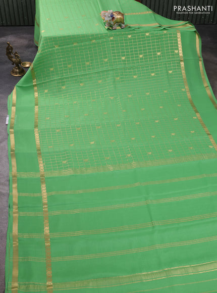 Pure mysore silk saree pastel green shade with allover zari checks & buttas and rettapet zari woven border