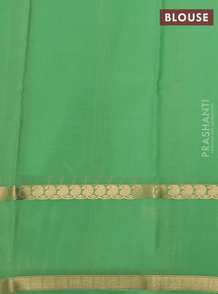 Pure mysore silk saree pastel green shade with allover zari checks & buttas and rettapet zari woven border
