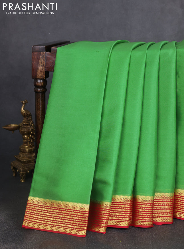 Pure mysore silk saree pastel green shade and red with plain body and zari woven border