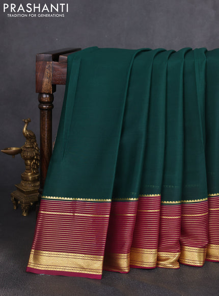 Pure mysore silk saree bottle green and wine shade with plain body and long zari woven border