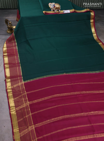 Pure mysore silk saree bottle green and wine shade with plain body and long zari woven border