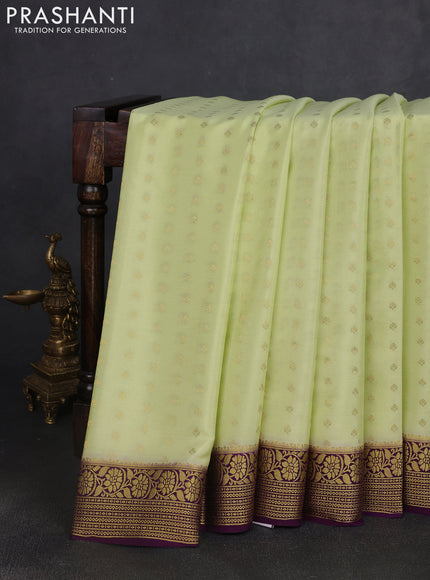 Pure mysore silk saree pale yellow and purple with allover zari woven buttas and zari woven border