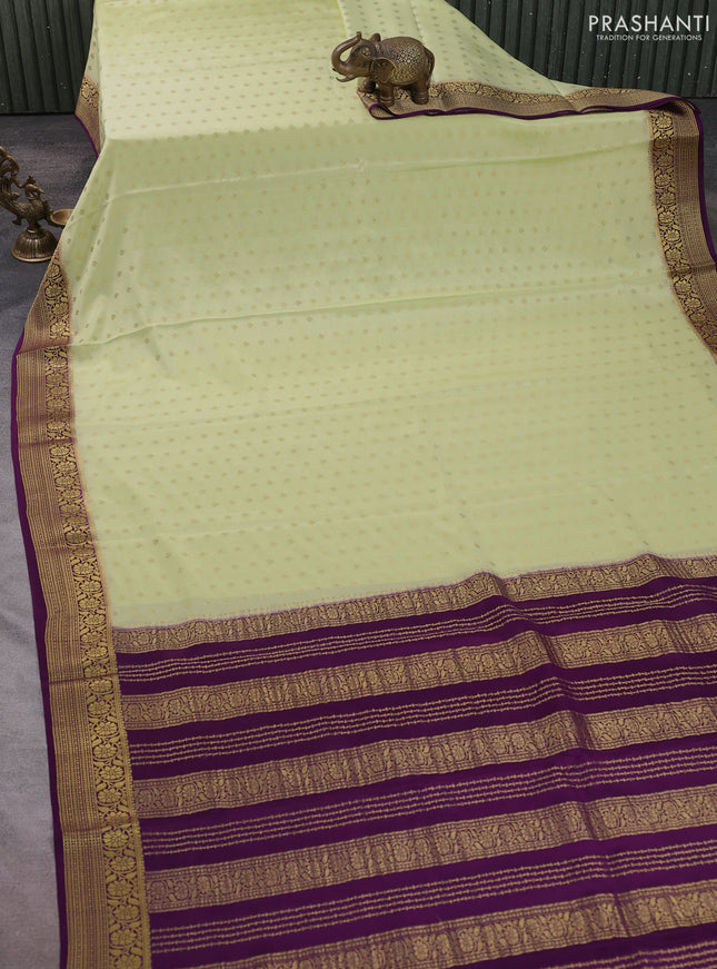 Pure mysore silk saree pale yellow and purple with allover zari woven buttas and zari woven border