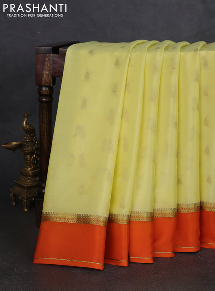 Pure mysore silk saree pale yellow and orange with zari woven buttas and rettapet zari woven border