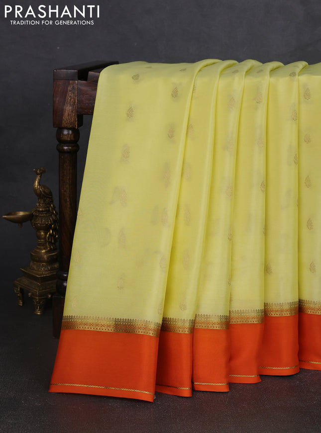 Pure mysore silk saree pale yellow and orange with zari woven buttas and rettapet zari woven border