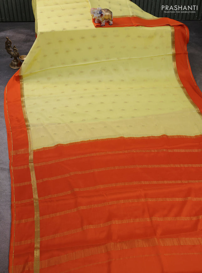 Pure mysore silk saree pale yellow and orange with zari woven buttas and rettapet zari woven border