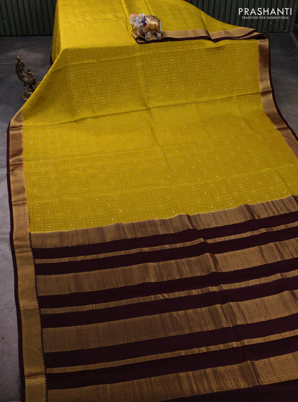 Pure mysore silk saree lime yellow and coffee brown with allover zari woven geometric buttas and zari woven border